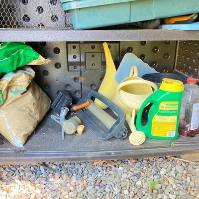 LOT 58: Outdoor Garden Storage Cabinet and Gardening Tool Supplies and Tomato Cages