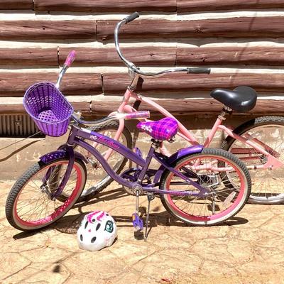 LOT 61: Women’s Pink Electra Bicycle, Girls Purple Kent Tiki Bay Bicycles and Child’s Helmet