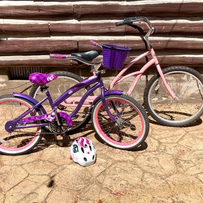 LOT 61: Women’s Pink Electra Bicycle, Girls Purple Kent Tiki Bay Bicycles and Child’s Helmet
