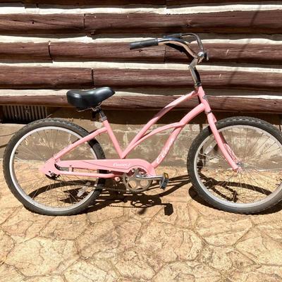 LOT 61: Women’s Pink Electra Bicycle, Girls Purple Kent Tiki Bay Bicycles and Child’s Helmet