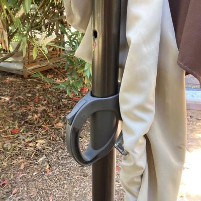 LOT 66: Large Adjustable Folding Patio Umbrella