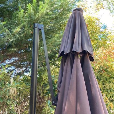 LOT 66: Large Adjustable Folding Patio Umbrella