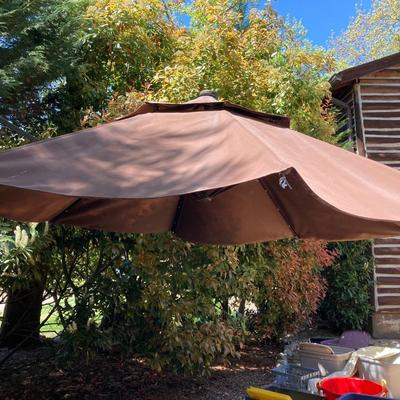 LOT 66: Large Adjustable Folding Patio Umbrella
