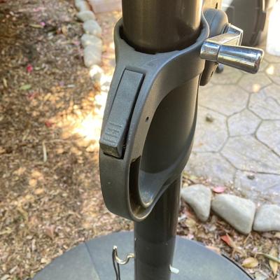 LOT 66: Large Adjustable Folding Patio Umbrella