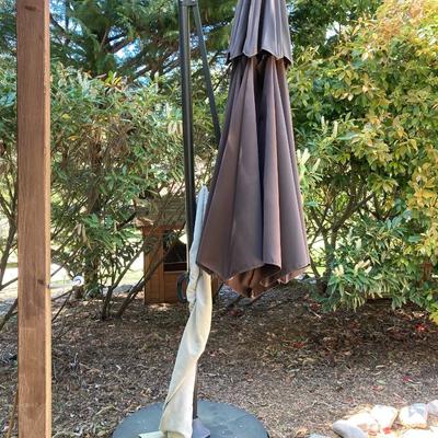 LOT 66: Large Adjustable Folding Patio Umbrella