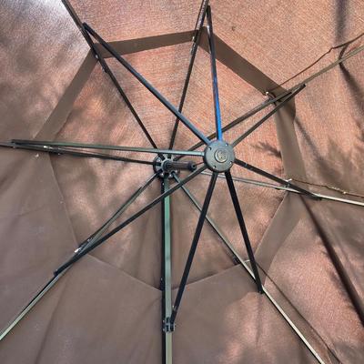 LOT 66: Large Adjustable Folding Patio Umbrella