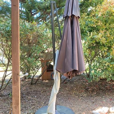 LOT 66: Large Adjustable Folding Patio Umbrella