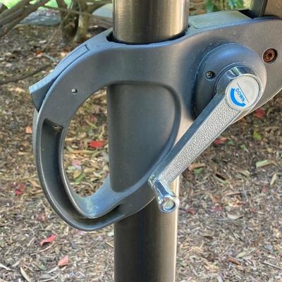 LOT 66: Large Adjustable Folding Patio Umbrella
