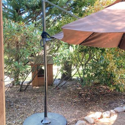 LOT 66: Large Adjustable Folding Patio Umbrella