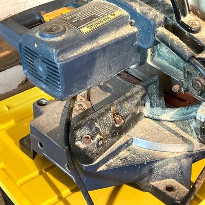 LOT 75: Ryobi Electric Compound Miter Saw, and an Electric Skil Saw