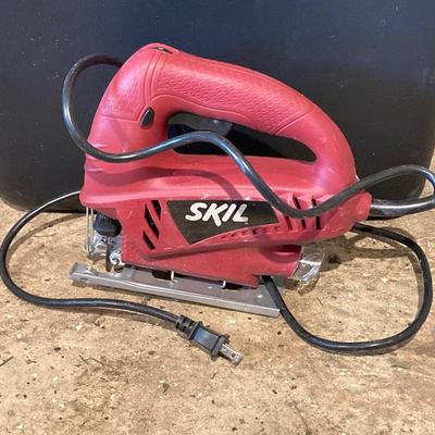 LOT 75: Ryobi Electric Compound Miter Saw, and an Electric Skil Saw