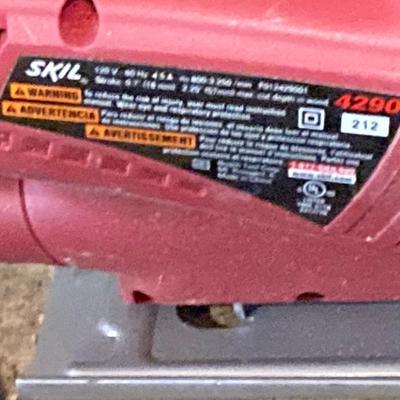 LOT 75: Ryobi Electric Compound Miter Saw, and an Electric Skil Saw