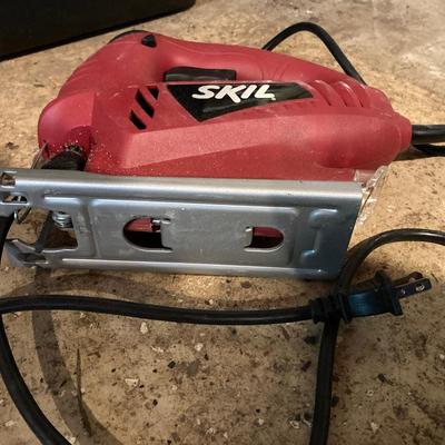 LOT 75: Ryobi Electric Compound Miter Saw, and an Electric Skil Saw