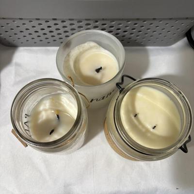 LOT 108: Large Selection Slightly Burned of Scented Candles and Candle Holders Including Flameless Candles