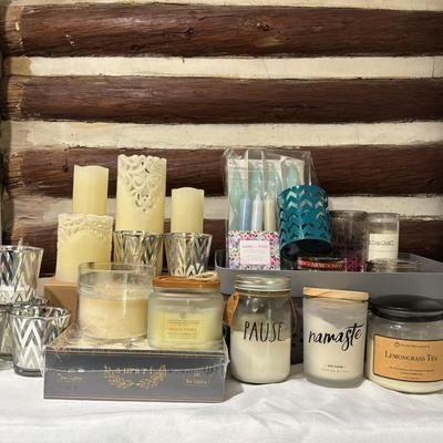 LOT 108: Large Selection Slightly Burned of Scented Candles and Candle Holders Including Flameless Candles