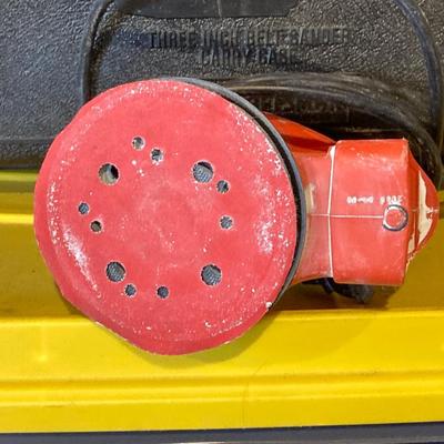 LOT 111: Craftsman Three Inch Belt Sander with Carry Case, Black & Decker Electric Orbital Sander, Chicago Electric Angle Grinder