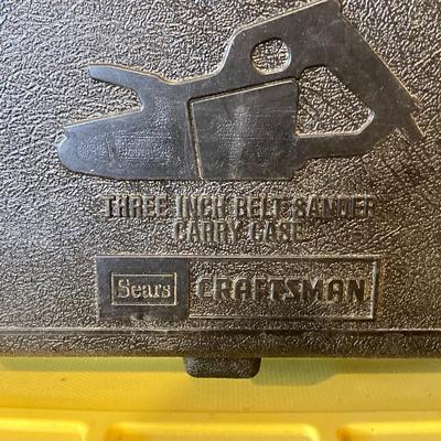 LOT 111: Craftsman Three Inch Belt Sander with Carry Case, Black & Decker Electric Orbital Sander, Chicago Electric Angle Grinder