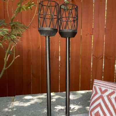 LOT 115: Outdoor Livin’ Includes and Lewis & Clark Fold & Go Directors Chair, Tiki Torches, Cooler, Copper Plated Bottle Holder...