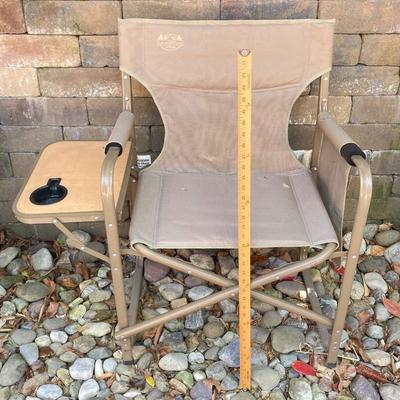 LOT 115: Outdoor Livin’ Includes and Lewis & Clark Fold & Go Directors Chair, Tiki Torches, Cooler, Copper Plated Bottle Holder...