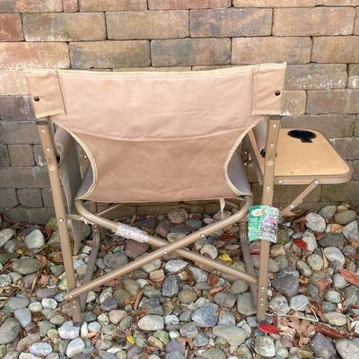 LOT 115: Outdoor Livin’ Includes and Lewis & Clark Fold & Go Directors Chair, Tiki Torches, Cooler, Copper Plated Bottle Holder...