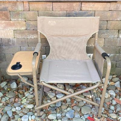 LOT 115: Outdoor Livin’ Includes and Lewis & Clark Fold & Go Directors Chair, Tiki Torches, Cooler, Copper Plated Bottle Holder...