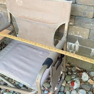 LOT 115: Outdoor Livin’ Includes and Lewis & Clark Fold & Go Directors Chair, Tiki Torches, Cooler, Copper Plated Bottle Holder...