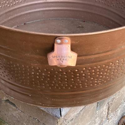 LOT 115: Outdoor Livin’ Includes and Lewis & Clark Fold & Go Directors Chair, Tiki Torches, Cooler, Copper Plated Bottle Holder...