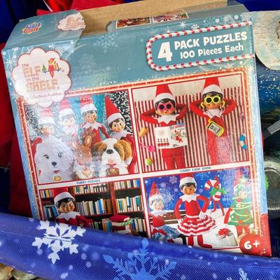LOT 119: Large Assortment of Holiday Indoor and Out Decorations and More Including Puzzles, Gift Boxes , Lights and Much More