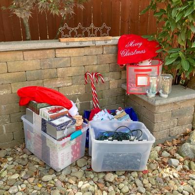 LOT 119: Large Assortment of Holiday Indoor and Out Decorations and More Including Puzzles, Gift Boxes , Lights and Much More