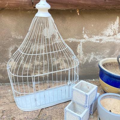 LOT 121: Home Decor Collection - Ceramic / Pottery Planters, Silver Plated Pitcher and Utensil Wind Chimes, Two White Wire Bird Cages and...