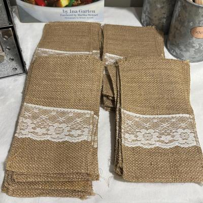 LOT 136: Kitchen Collection Featuring Longaberger Basket, Crate & Barrel and Food Network Utensils,(40) Burlap Flatware Holders,...