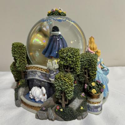 LOT 141: Disney Princesses - Snow White Snow Globe Music Box with Cinderella, Sleeping Beauty, Bell and The Little Mermaid