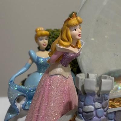 LOT 141: Disney Princesses - Snow White Snow Globe Music Box with Cinderella, Sleeping Beauty, Bell and The Little Mermaid