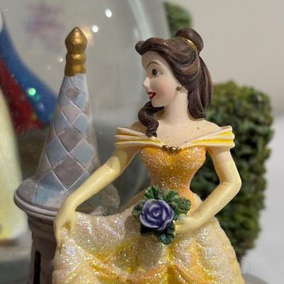 LOT 141: Disney Princesses - Snow White Snow Globe Music Box with Cinderella, Sleeping Beauty, Bell and The Little Mermaid