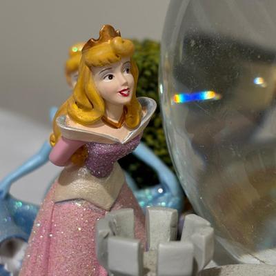 LOT 141: Disney Princesses - Snow White Snow Globe Music Box with Cinderella, Sleeping Beauty, Bell and The Little Mermaid
