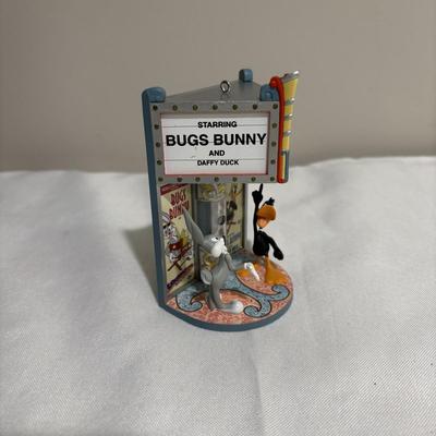 LOT 142: Walt Disney Classic Collection Dumbo “When I See Elephant Fly” Ornament with COA and Original Box, Looney Tunes Sylvester &...