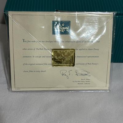 LOT 142: Walt Disney Classic Collection Dumbo “When I See Elephant Fly” Ornament with COA and Original Box, Looney Tunes Sylvester &...
