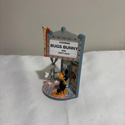 LOT 142: Walt Disney Classic Collection Dumbo “When I See Elephant Fly” Ornament with COA and Original Box, Looney Tunes Sylvester &...