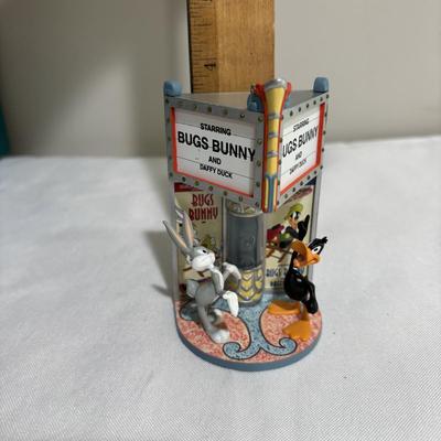 LOT 142: Walt Disney Classic Collection Dumbo “When I See Elephant Fly” Ornament with COA and Original Box, Looney Tunes Sylvester &...