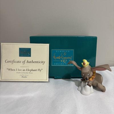 LOT 142: Walt Disney Classic Collection Dumbo “When I See Elephant Fly” Ornament with COA and Original Box, Looney Tunes Sylvester &...