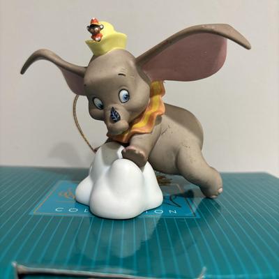 LOT 142: Walt Disney Classic Collection Dumbo “When I See Elephant Fly” Ornament with COA and Original Box, Looney Tunes Sylvester &...