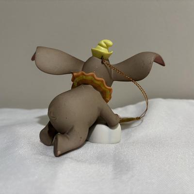 LOT 142: Walt Disney Classic Collection Dumbo “When I See Elephant Fly” Ornament with COA and Original Box, Looney Tunes Sylvester &...