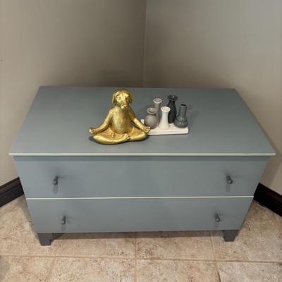 LOT 160: Small Chest of Drawers, Poly Resin Yoga Dog, Home Decor Connected Mini-Bud Vases & Towels