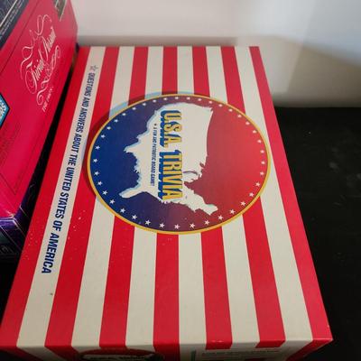 Lot of 8 Trivia Pursuit Board Games