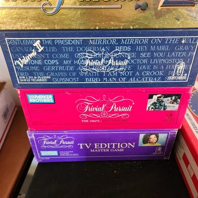 Lot of 8 Trivia Pursuit Board Games