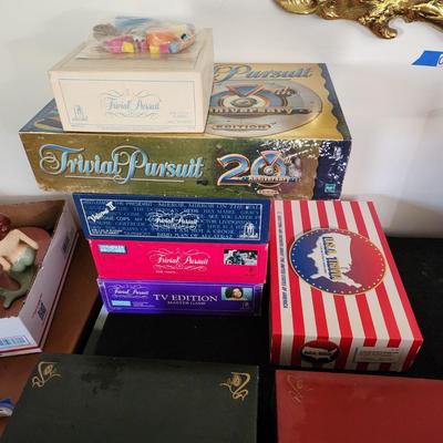 Lot of 8 Trivia Pursuit Board Games