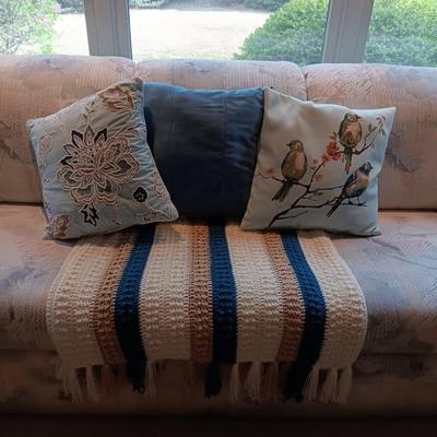 3 THROW PILLOWS AND A HAND CROCHETED THROW BLANKET