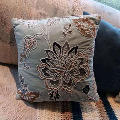 3 THROW PILLOWS AND A HAND CROCHETED THROW BLANKET