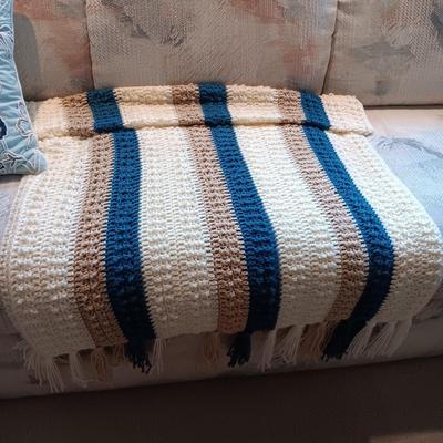 3 THROW PILLOWS AND A HAND CROCHETED THROW BLANKET