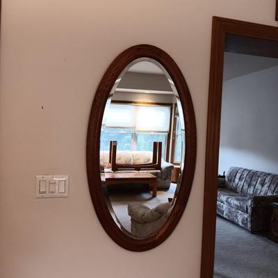 BEVELED OVAL WALL MIRROR WITH WOODEN FRAME